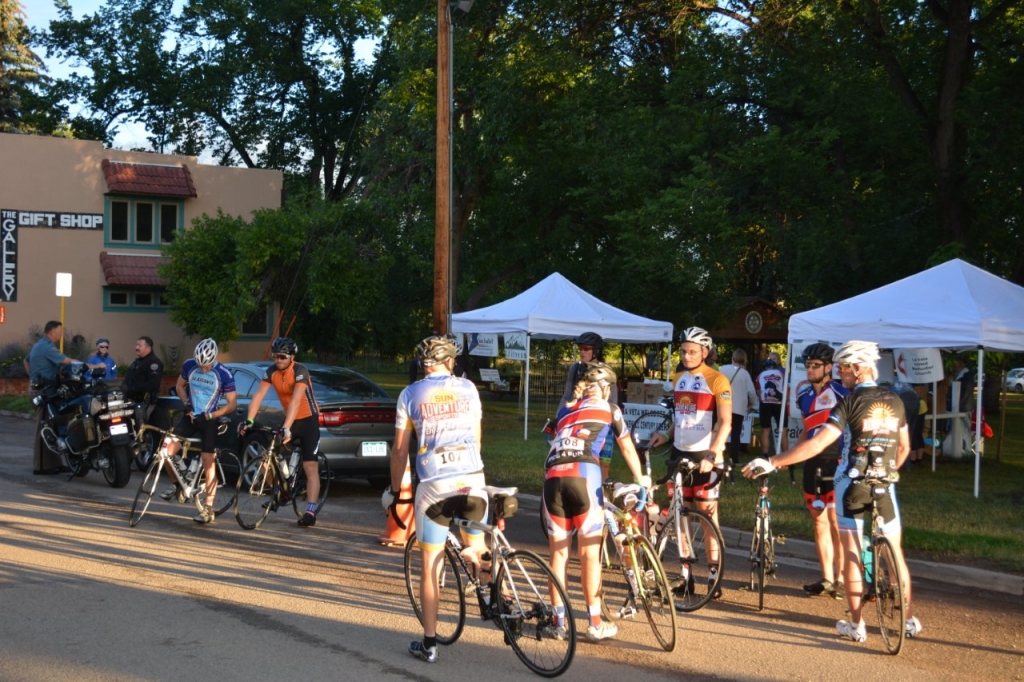 ABOVE: Even at 6:30 a.m. riders were amassing to head out on a 100 mile trek up and over Cuchara Pass known as the Stonewall Century Ride.  More than 200 bicyclists were in La Veta for the event this past Saturday, along with family and friends. The event saw support from local businesses, the Colorado State Patrol, area fire departments, local police, and many volunteers with the Spanish Peaks Cycling Association. Remember to be safe and “Share the Road” with cyclists.  Photo by Bob Kennemer.
